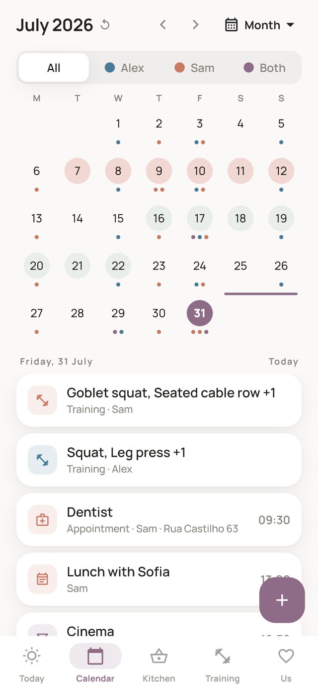 Month view of the shared calendar with coloured dots marking whose event is whose